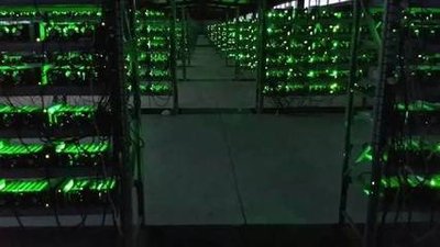 A well-organized mining farm showcasing various rigs and efficient cooling systems.